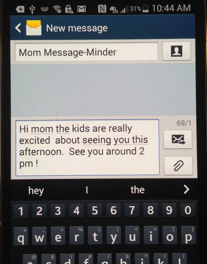 New message screen on a phone: Hi mom the kids are really excited about seeing you this afternoon. See you around 2 pm!
